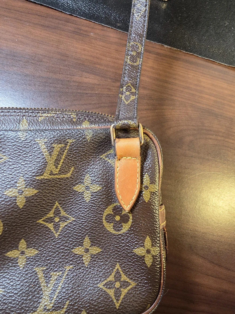 Vintage (1990) Louis Vuitton Marly Bandoulière in Monogram coated canvas.